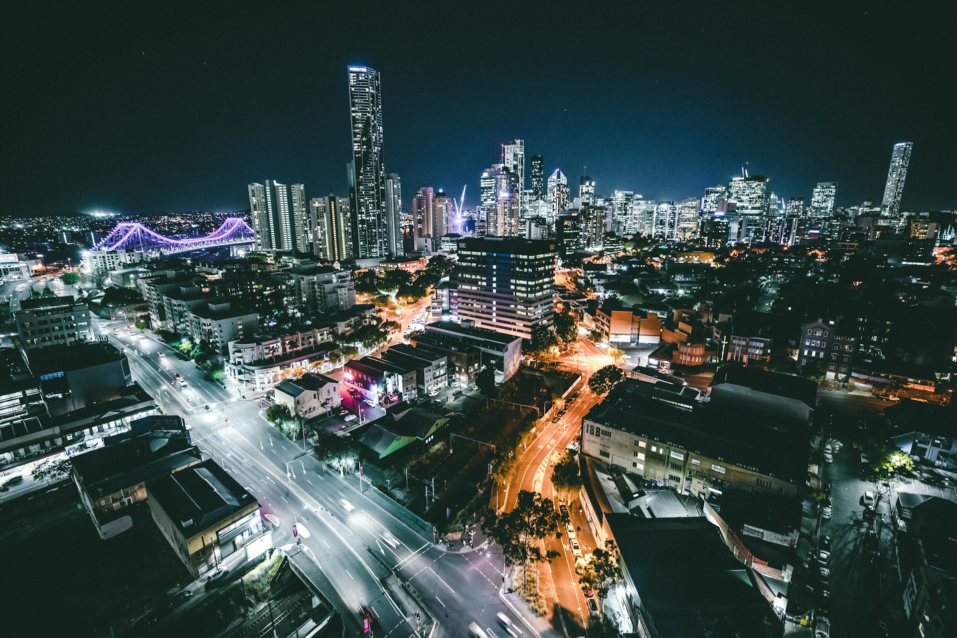 Brisbane city skyline at night, showcasing the vibrant and growing Brisbane startup ecosystem.